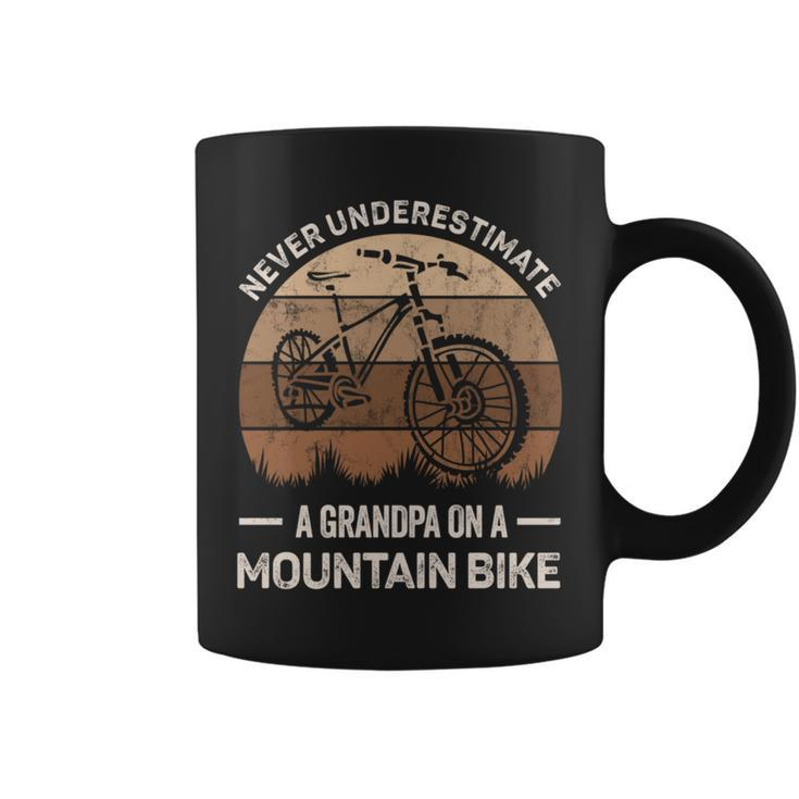 Never Underestimate A Grandpa On A Mountain Bike Bicycling Grandpa Funny Gifts Coffee Mug