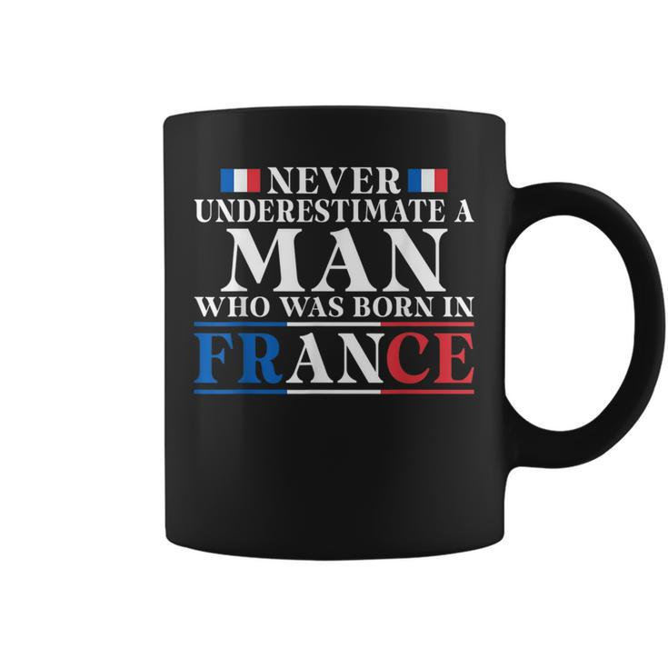 Never Underestimate A Man Who Was Born In France Coffee Mug