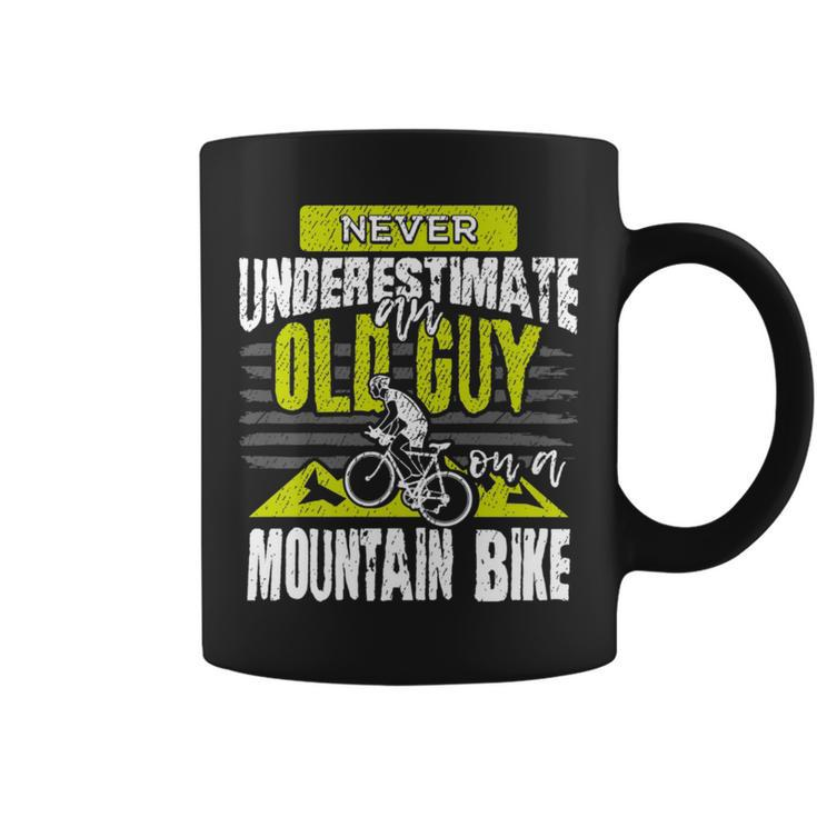 Never Underestimate An Old Guy On A Mountain Bike Cycling Cycling Funny Gifts Coffee Mug