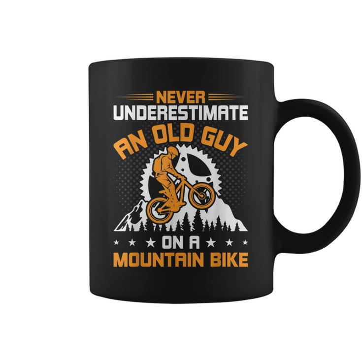 Never Underestimate An Old Guy On Mountain Bike Cycling Gift Cycling Funny Gifts Coffee Mug