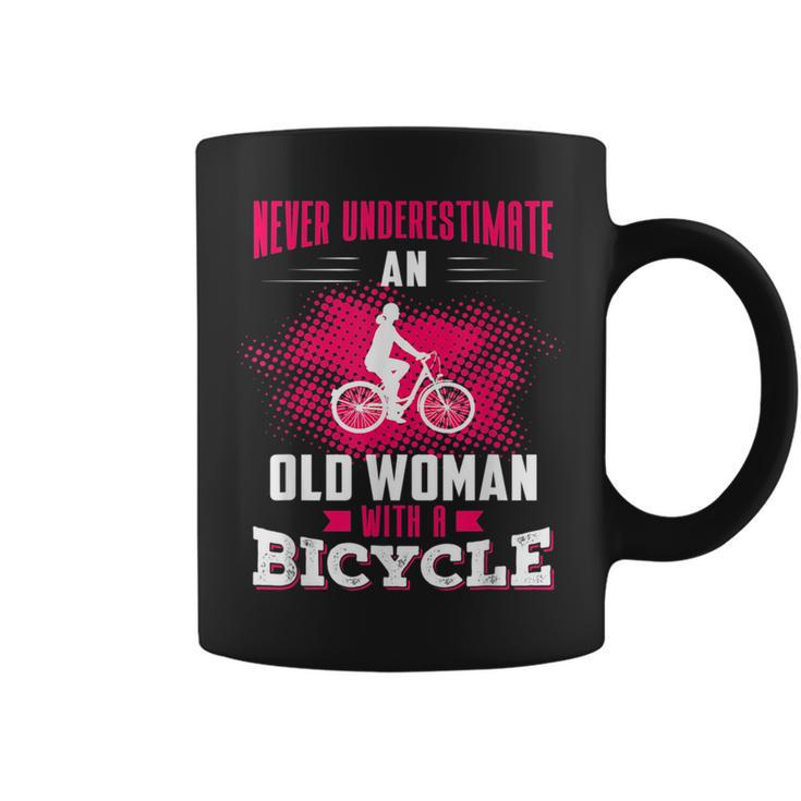 Never Underestimate An Old Woman With A Bicycle Pink Old Woman Funny Gifts Coffee Mug
