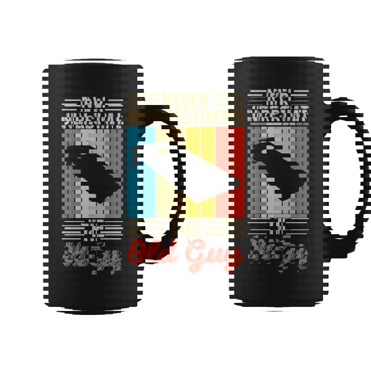Never Underestimate The Old Guy Funny Cornhole Player Mens Coffee Mug