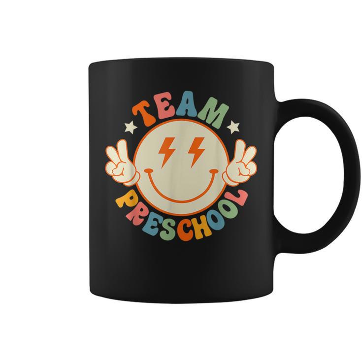Team Preschool Retro Groovy Hippie Face Back To School  Coffee Mug