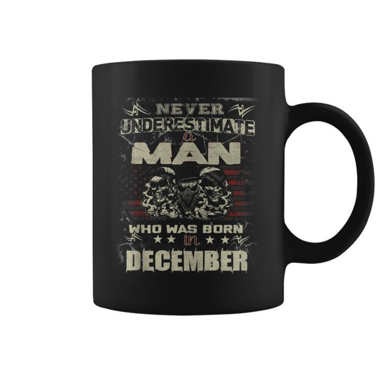 Never Underestimate A Man Who Was Born In December Coffee Mug
