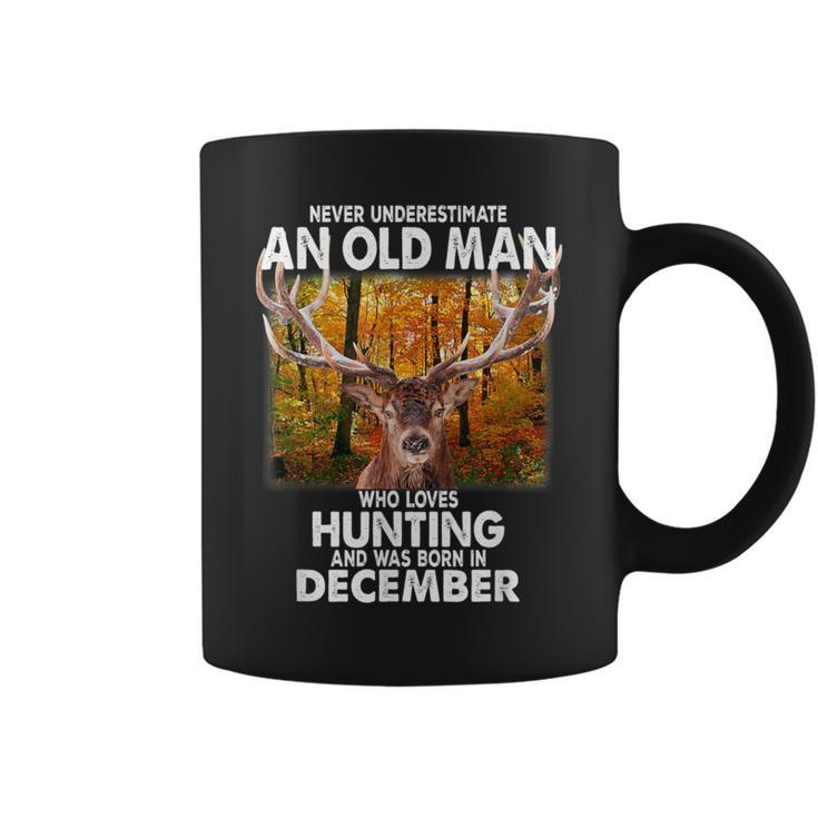 Never Underestimate A Man Loves Hunting Born In December Coffee Mug