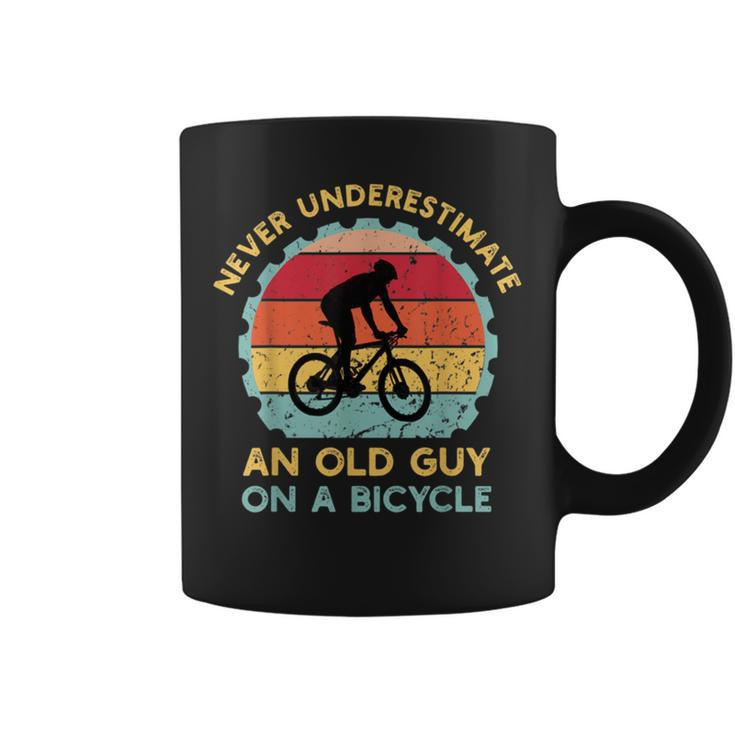 Never Underestimate An Old Guy On A Bicycle Vintage Coffee Mug