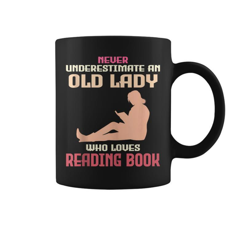Never Underestimate An Old Lady Who Loves Reading Book Coffee Mug