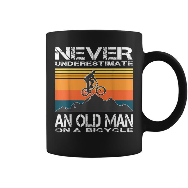 Never Underestimate An Old Man On A Bicycle Cycling Vintage Coffee Mug
