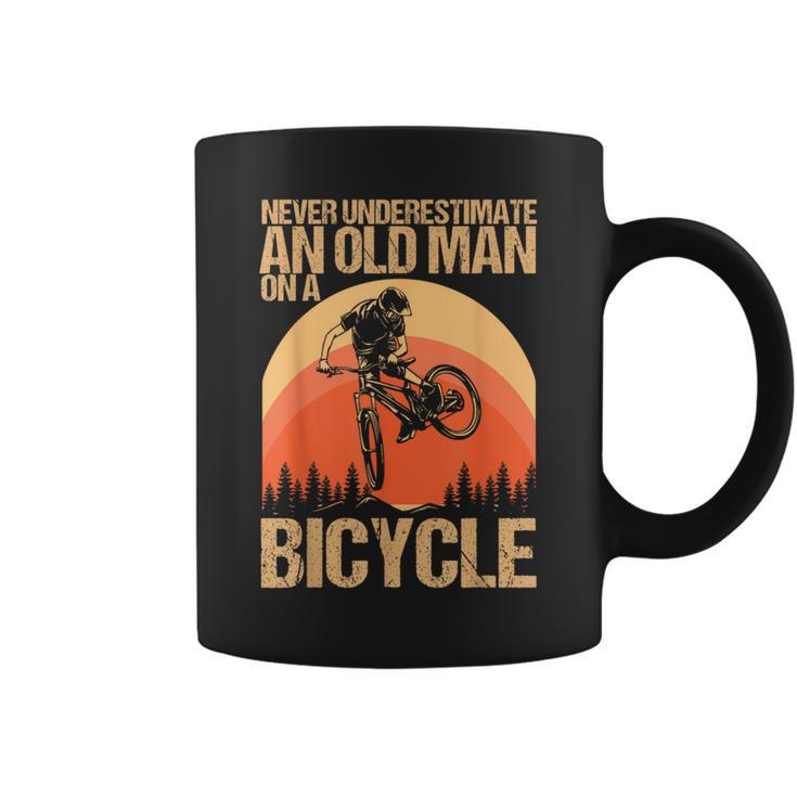 Never Underestimate An Old Man On A Bicycle Cycling Coffee Mug