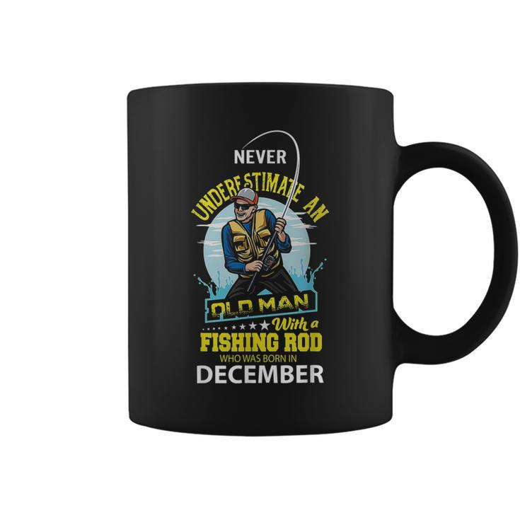 Never Underestimate Old Man With A Fishing Rod Born In Dec Coffee Mug