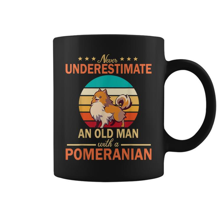 Never Underestimate An Old Man With A Pomeranian Dogs Father Coffee Mug