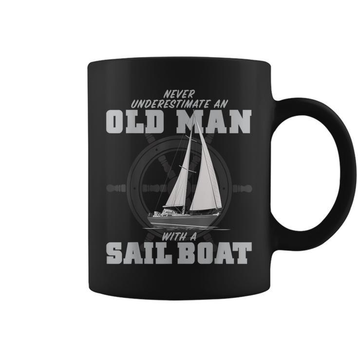 Never Underestimate An Old Man With A Sail Boat Coffee Mug