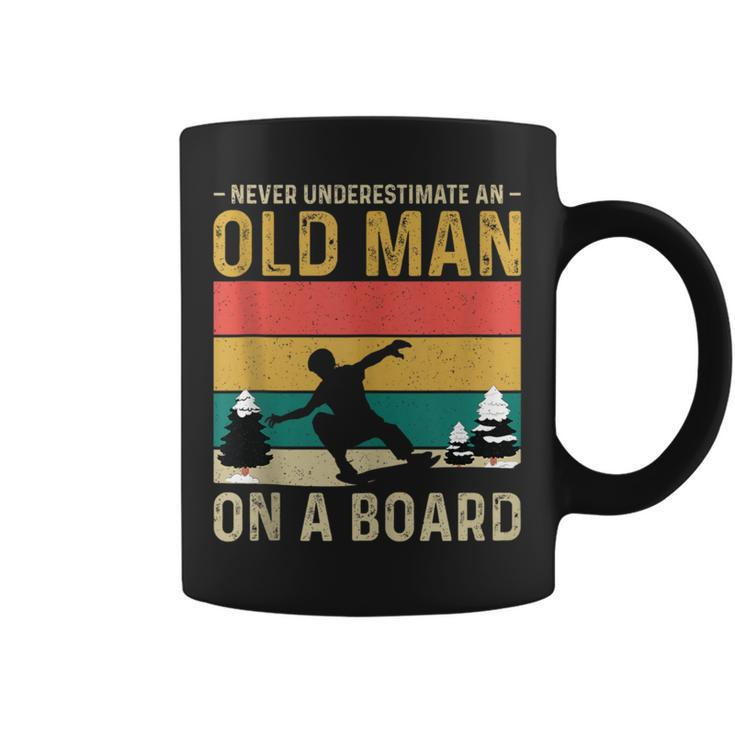 Never Underestimate An Old Man On A Snowboard Vintage Coffee Mug