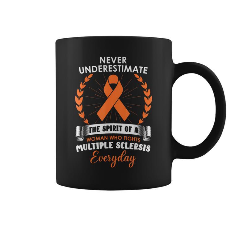 Never Underestimate A Woman Fights Multiple Sclerosis Coffee Mug