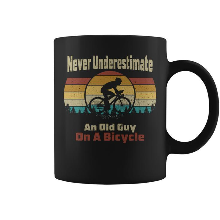 Vintage Cycling Never Underestimate An Old Guy On A Bicycle Cycling Funny Gifts Coffee Mug