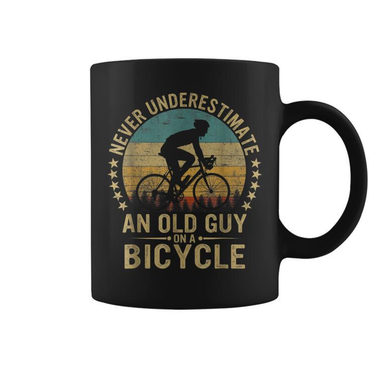 Vintage Never Underestimate An Old Guys On A Bicycle Cycling Cycling Funny Gifts Coffee Mug