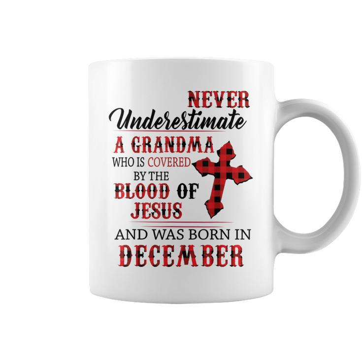 December Never Underestimate A Grandma Covered By The Blood Coffee Mug