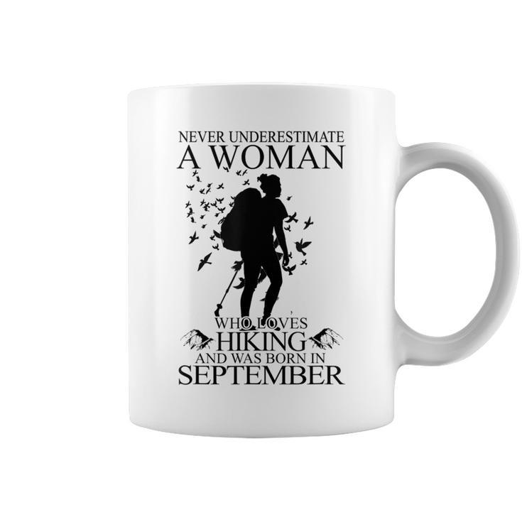 Never Underestimate A Woman Who Loves Hiking September Coffee Mug