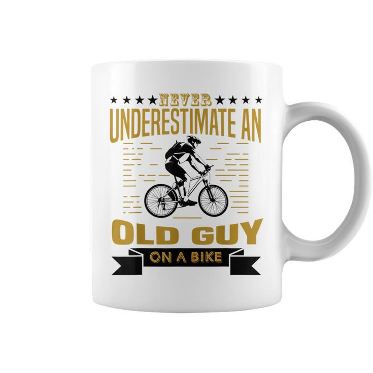 Never Underestimate An Old Guy On A Bicycle Cycling Lover Cycling Funny Gifts Coffee Mug