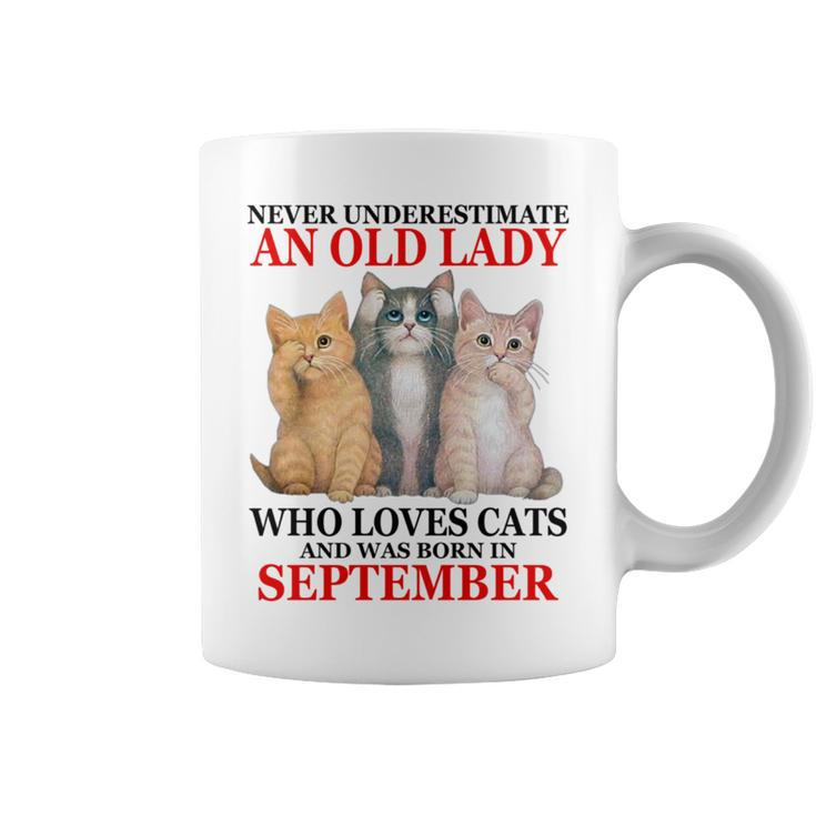 Never Underestimate An Old Lady Who Loves Cats September Coffee Mug