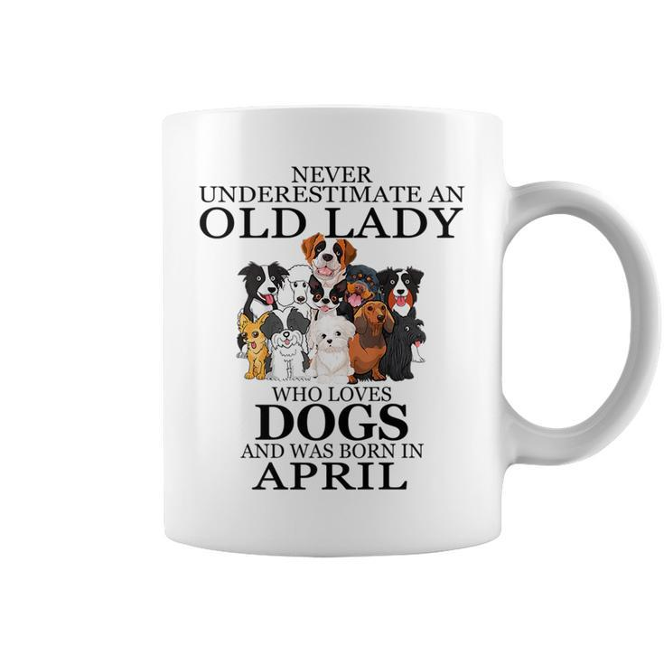 Never Underestimate An Old Lady Who Loves Dogs April Coffee Mug