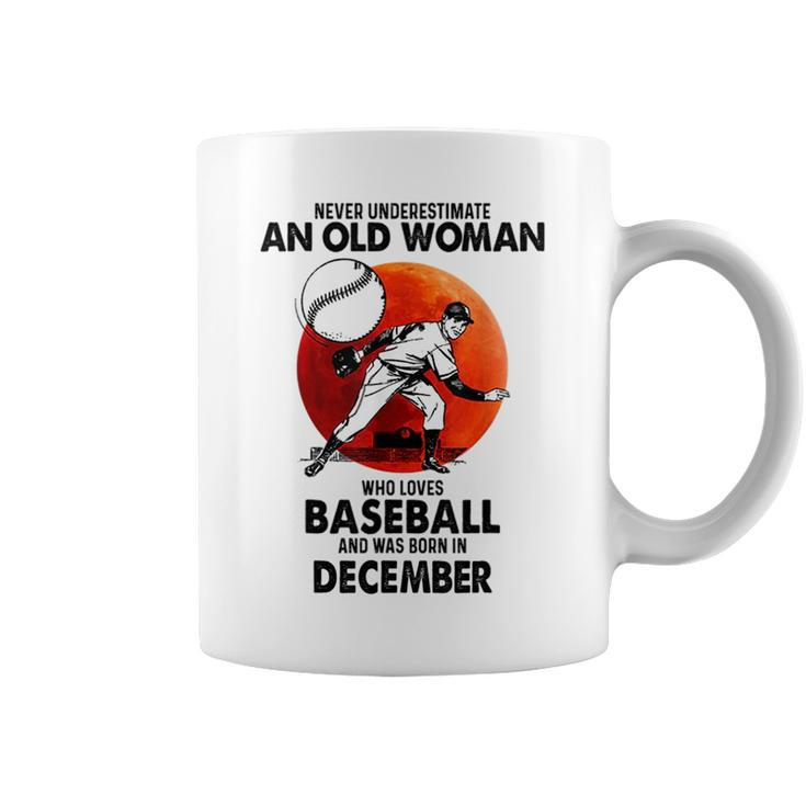 Never Underestimate An Old Woman Love Baseball December Old Woman Funny Gifts Coffee Mug