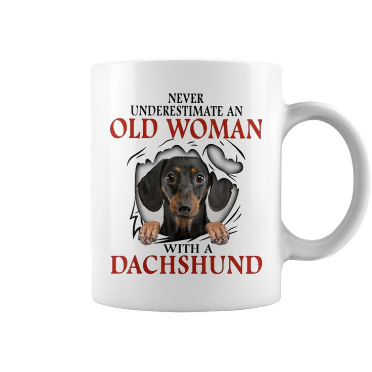 Never Underestimate An Old Woman With A Dachshund Coffee Mug