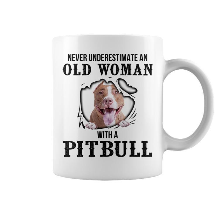 Never Underestimate An Old Woman With A Pitbull Old Woman Funny Gifts Coffee Mug
