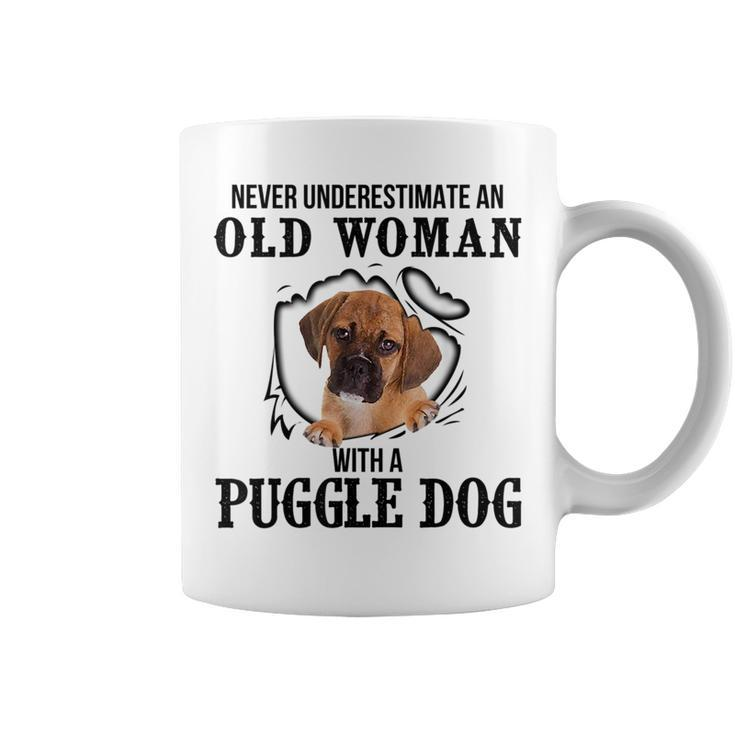 Never Underestimate An Old Woman With A Puggle Dog Old Woman Funny Gifts Coffee Mug