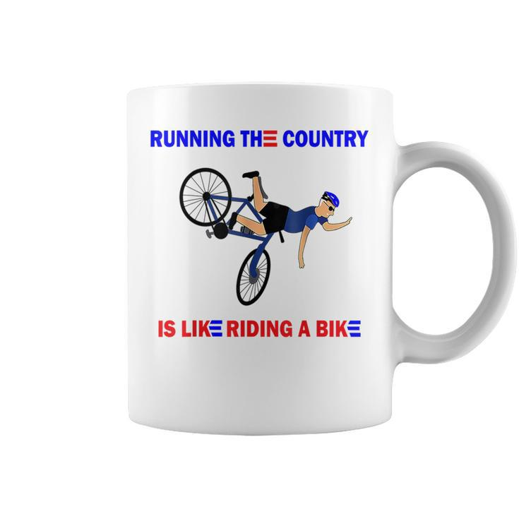 Running The Country Is Like Riding A Bike Funny Biden Fall Running Funny Gifts Coffee Mug
