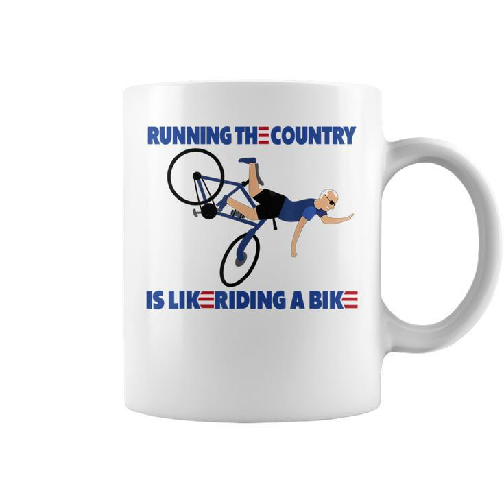 Running The Coutry Is Like Riding A Bike Joe Biden Funny Running Funny Gifts Coffee Mug