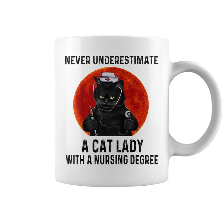 Never Underestimate A Cat Lady With A Nursing Degree Coffee Mug