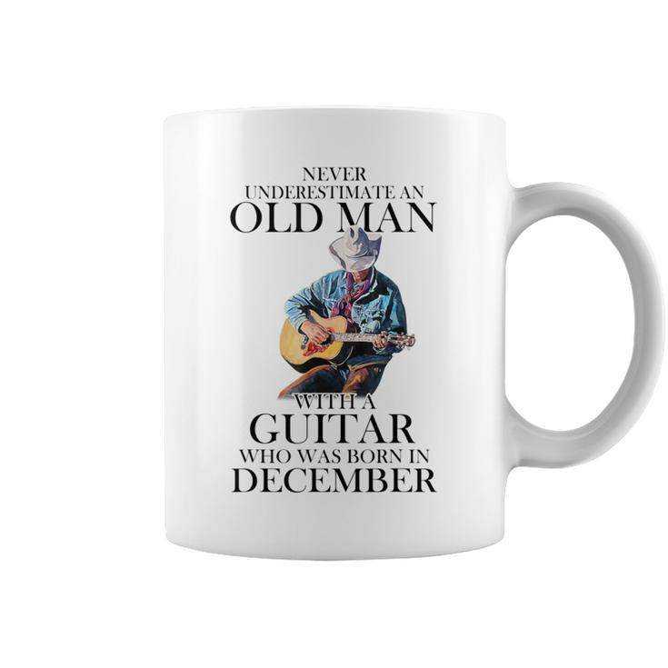 Never Underestimate A December Man With A Guitar Coffee Mug