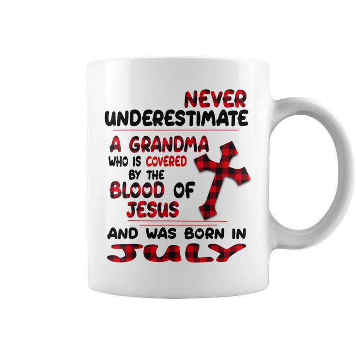Never Underestimate A Grandma Blood Of Jesus July Coffee Mug