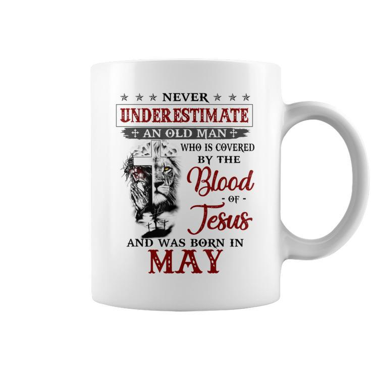 Never Underestimate A May Man Covered By Blood Of Jesus Coffee Mug