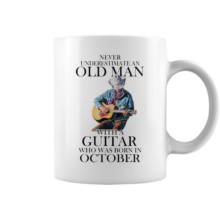 Never Underestimate A October Man With A Guitar Coffee Mug