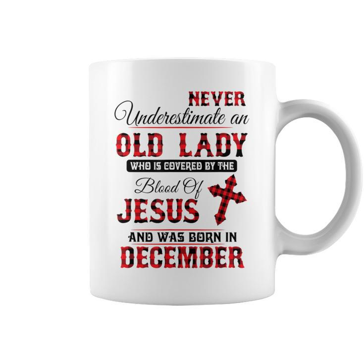 Never Underestimate An Old Lady Was Born In December Coffee Mug