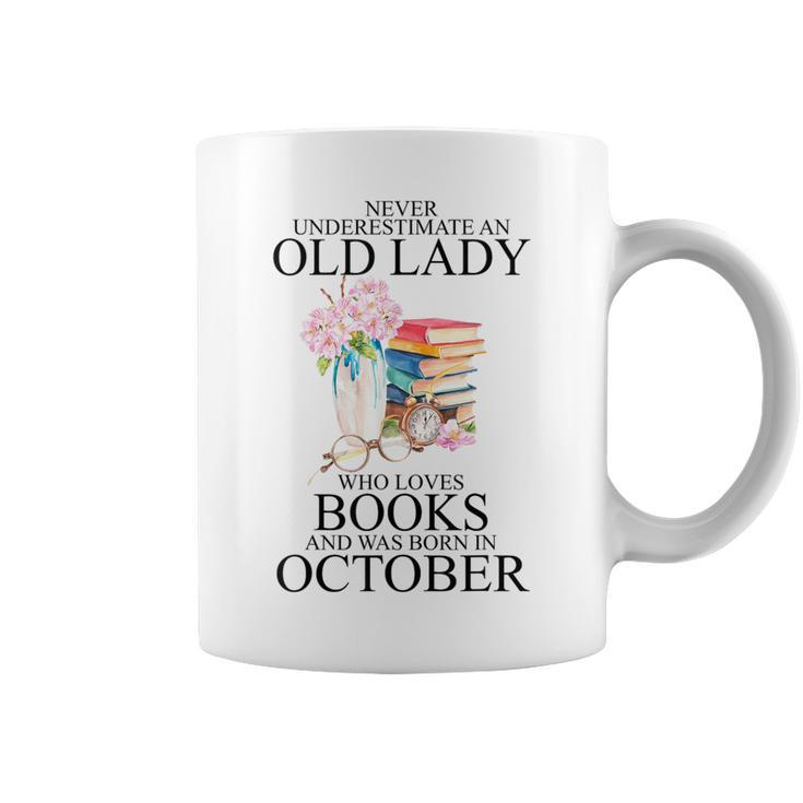 Never Underestimate An Old Lady Who Loves Books Born October Coffee Mug