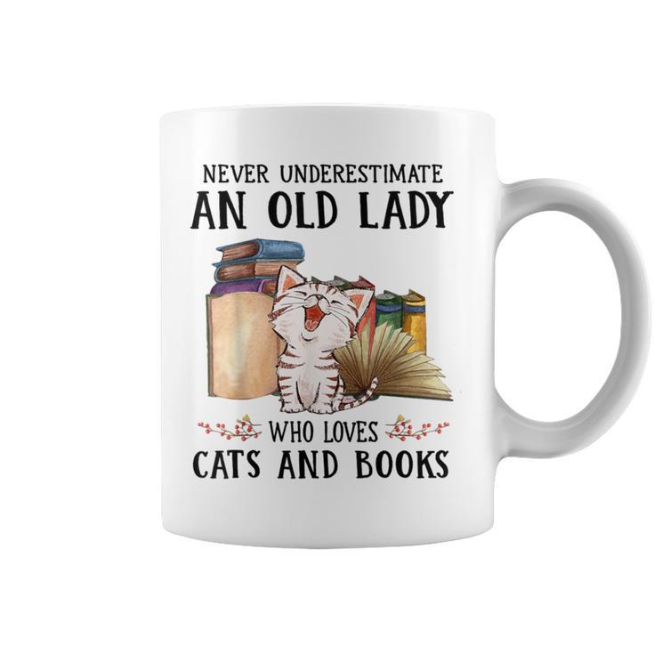 Never Underestimate An Old Lady Who Loves Cats And Books Coffee Mug