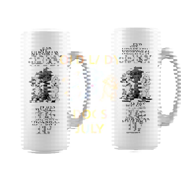 Never Underestimate Old Lady Loves Dogs Born In July Coffee Mug