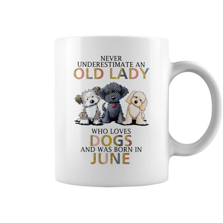 Never Underestimate Old Lady Loves Dogs Born In June Coffee Mug