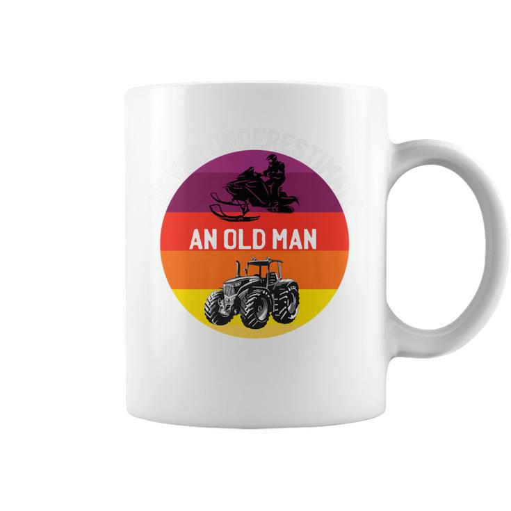 Never Underestimate An Old Man With A Snowmobile Tractor Coffee Mug