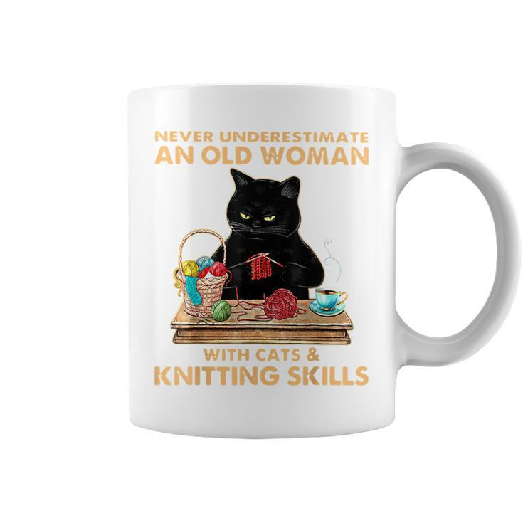 Never Underestimate An Old Woman With Cat And Knitting Coffee Mug