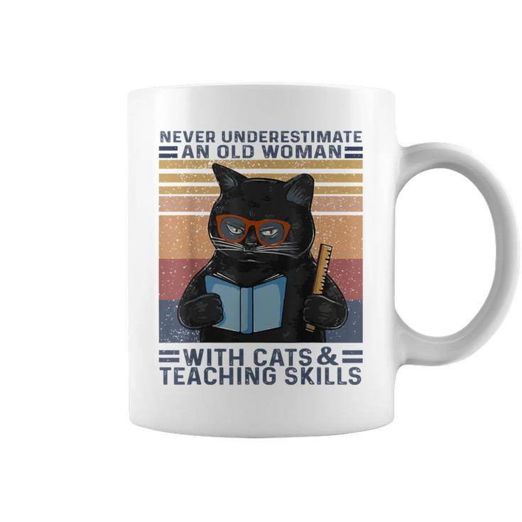Never Underestimate An Old Woman With Cats & Teaching Skills Coffee Mug