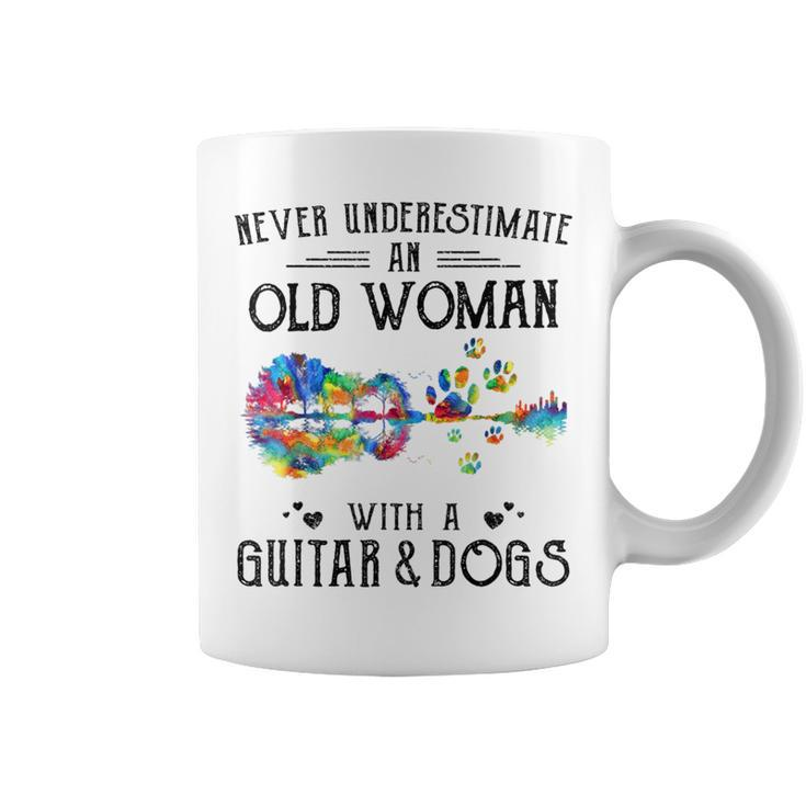 Never Underestimate An Old Woman With A Guitar And Dogs Coffee Mug
