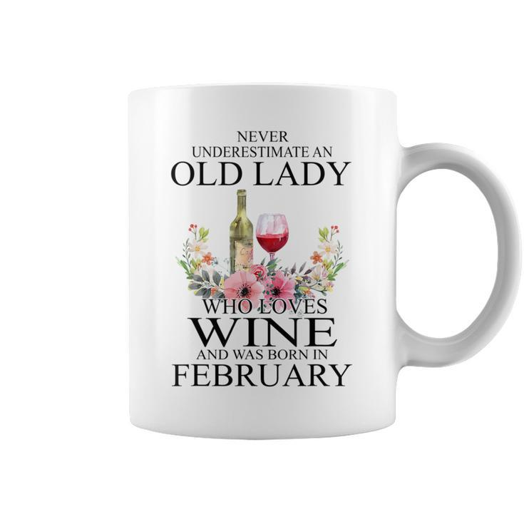 Never Underestimate An Old Woman Who Loves Wine February Coffee Mug