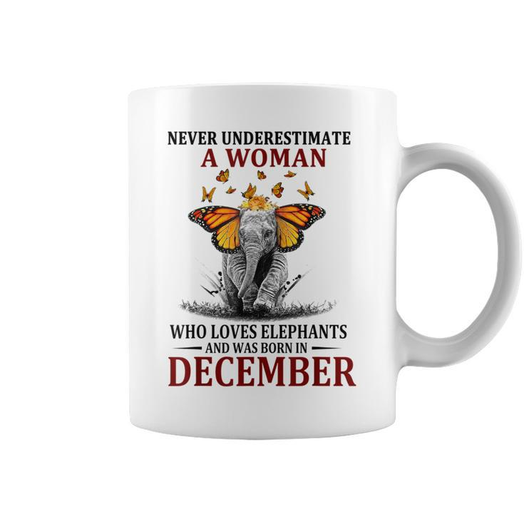 Never Underestimate A Woman Who Loves Elephants December Coffee Mug
