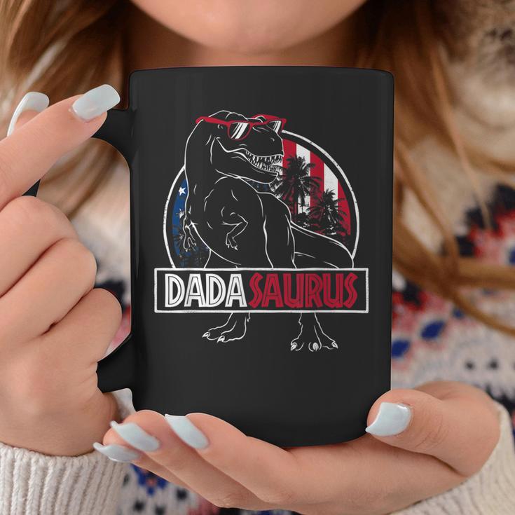 https://i3.cloudfable.net/styles/735x735/128.134/Black/dadasaurus-dinosaur-dad-daddy-rex-american-flag-dada-saurus-gift-for-mens-coffee-mug-20230430104713-kwia3k2b.jpg