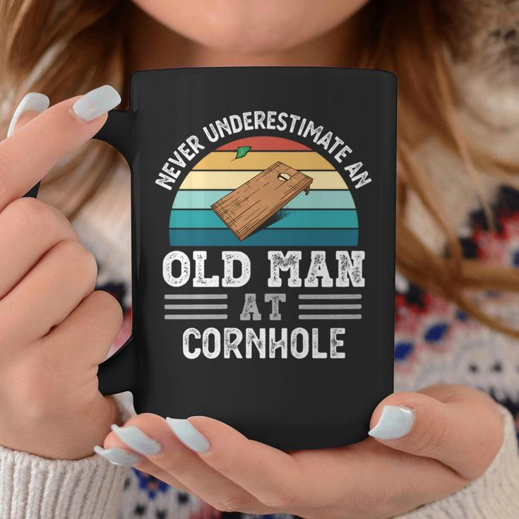 Never Underestimate An Old Man At Cornhole Fathers Day Coffee Mug Funny Gifts