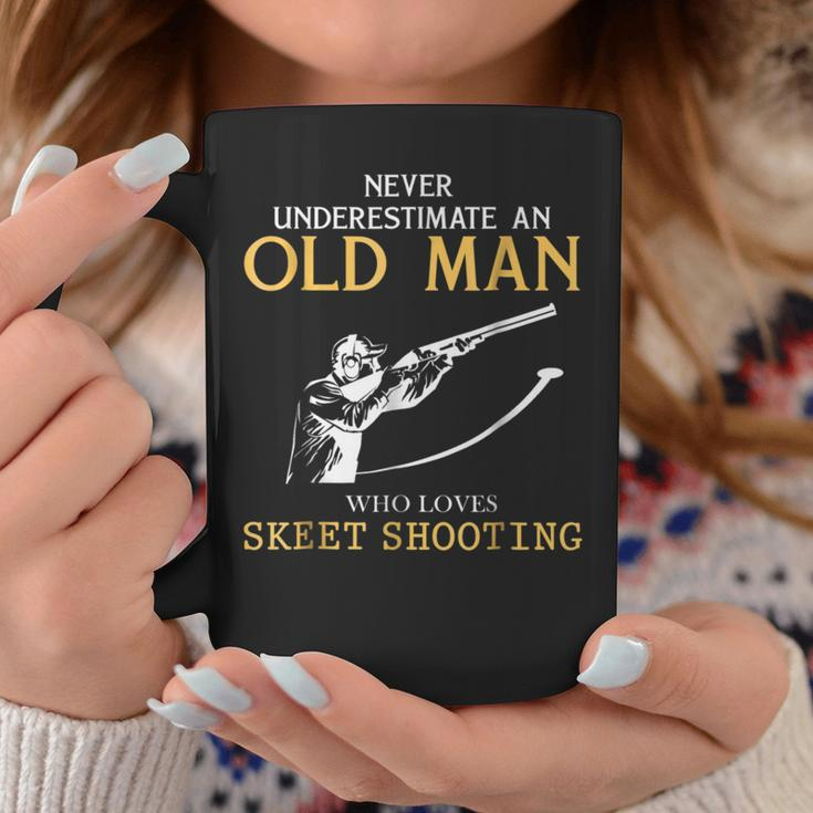 Never Underestimate An Old Man Who Loves Skeet Shooting Coffee Mug Funny Gifts